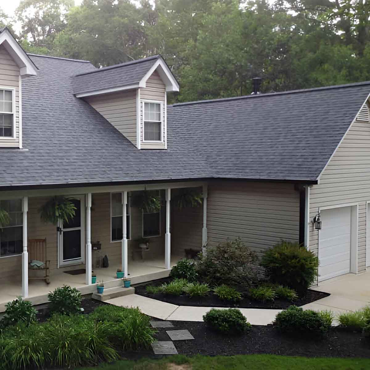 Completed residential home renovation in Lexington Park Maryland featuring new roofing, siding, and front porch by JDH Remodeling