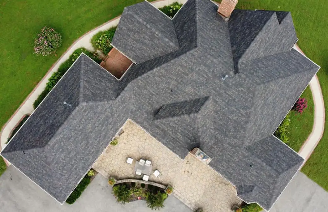 Storm damage roof inspection and insurance documentation on a Maryland home