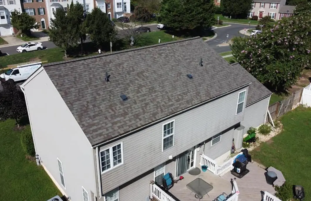 Aerial of a Clarks Rest Leonardtown Maryland subdivision with documented Owens Corning Duration Driftwood roofs on 2-story colonial homes documented by JDH Remodeling