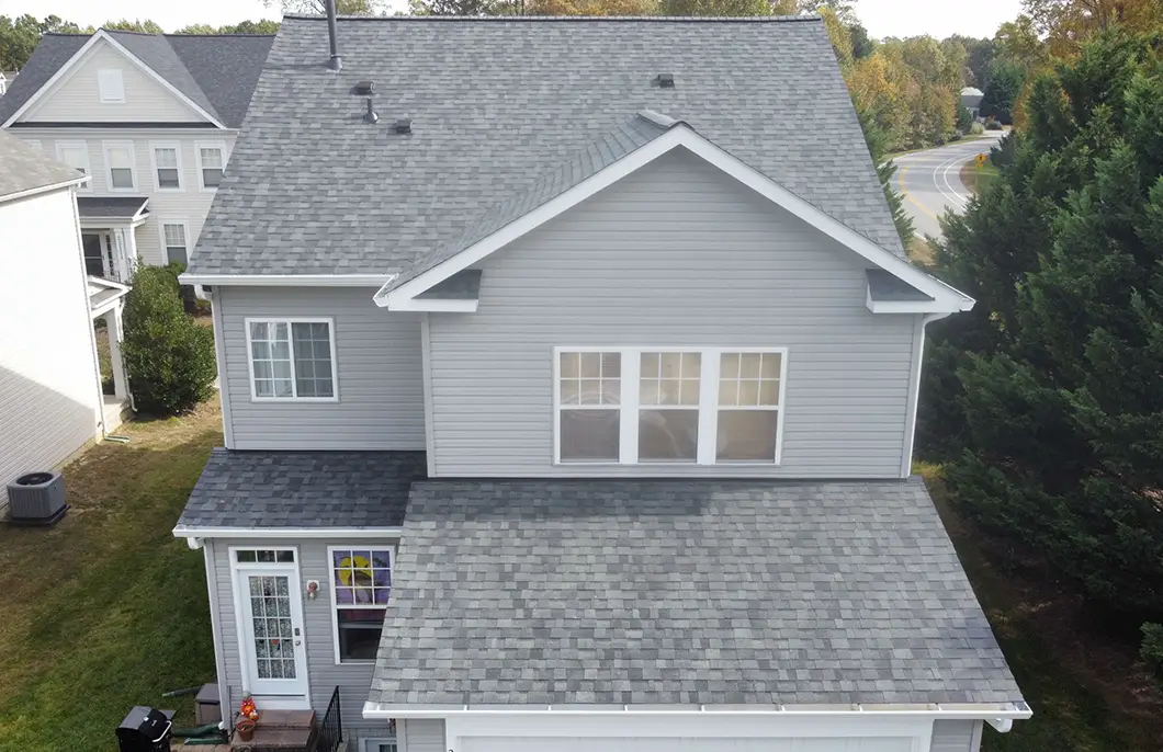 Completed Owens Corning Duration Estate Gray roof replacement on a Wildewood California Maryland two-story suburban colonial by JDH Remodeling