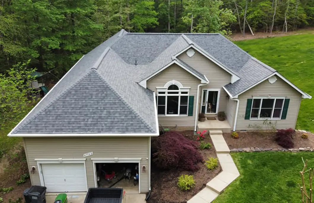 JDH Remodeling aerial completed Owens Corning Duration Estate Gray asphalt shingle roof replacement on a two-story Huntingtown Maryland colonial inside the Huntingtown High School catchment