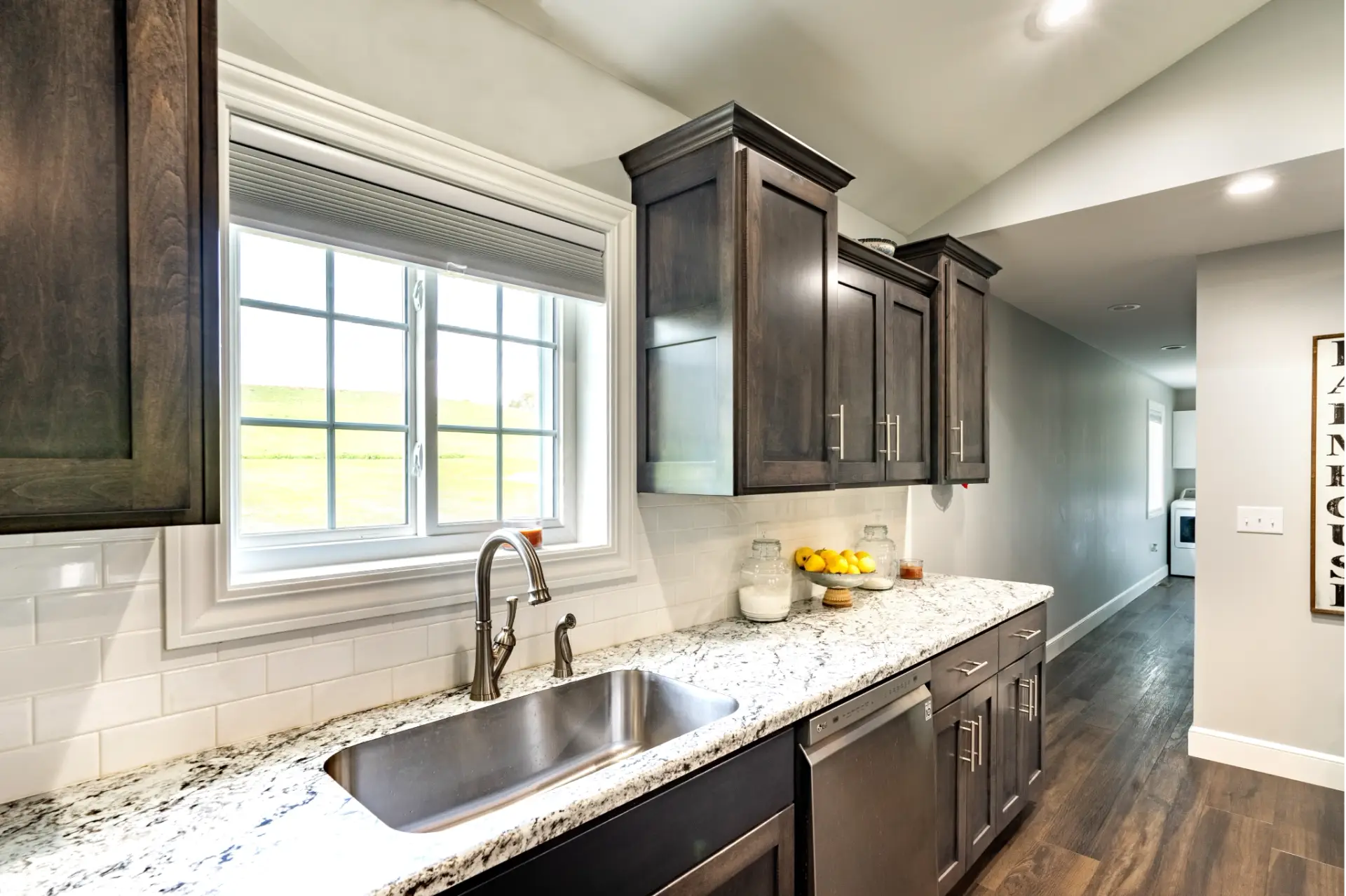 Modern kitchen with new double-hung ProVia replacement windows installed by JDH Remodeling on a Maryland home, financed through a 12-month no-interest plan