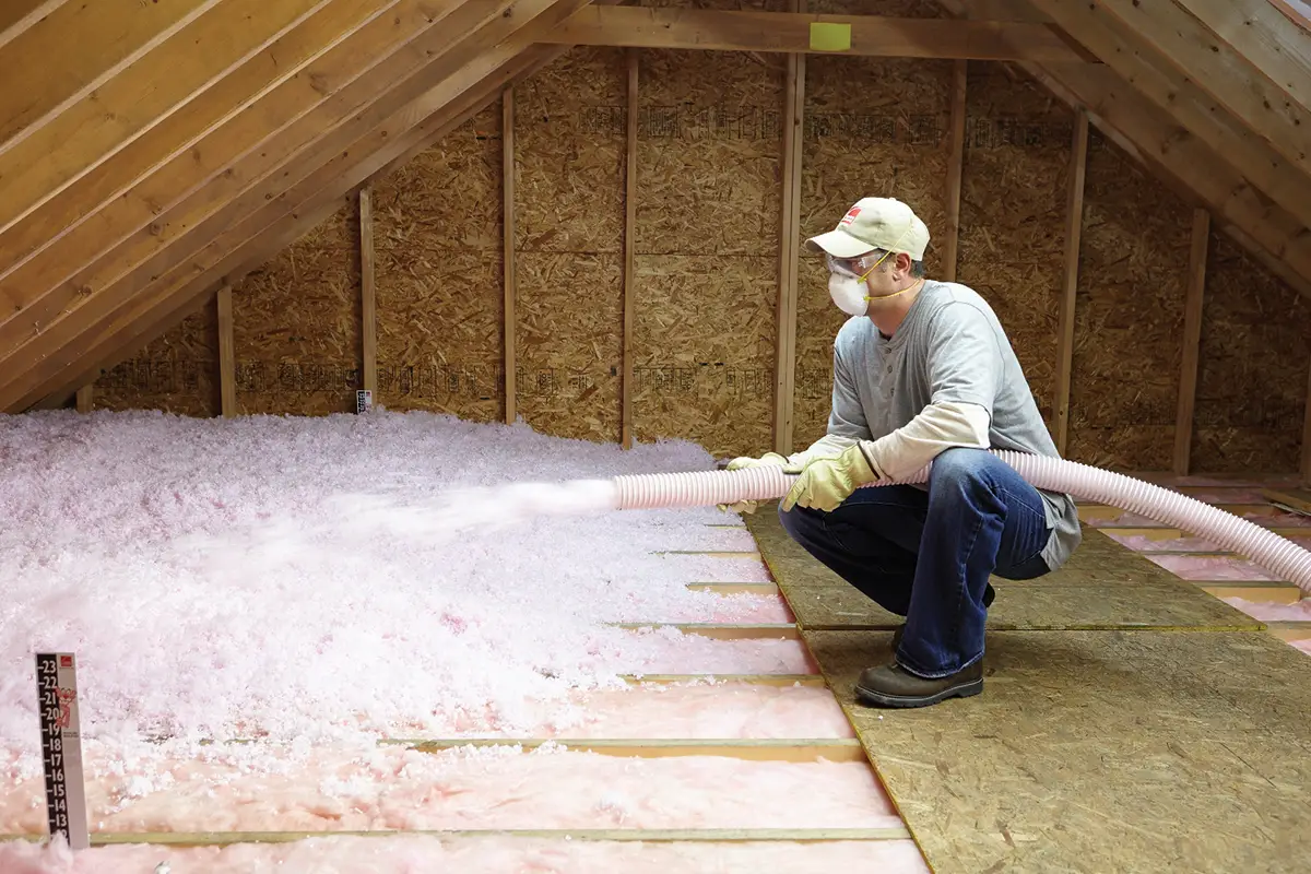 Blowing insulation into an attic