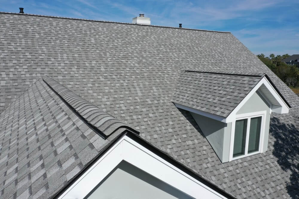 Gray shingle roof with dormer window