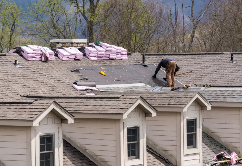 Roof material on a roof being repaired
