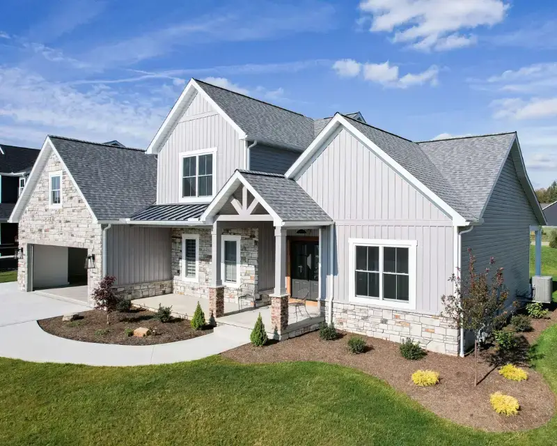 St. Mary’s County roofing contractor installing high-quality shingles on a residential home
