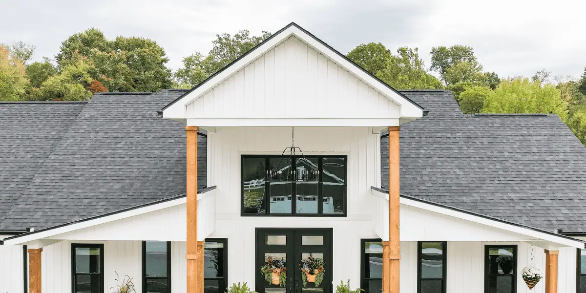 JDH Remodeling completed modern farmhouse exterior in Anne Arundel County Maryland with new asphalt shingle roofing, siding, windows, and doors representing Crofton 21114 housing stock