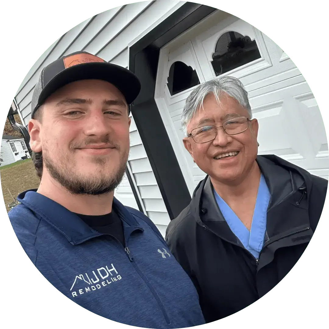 JDH Remodeling customer handshake representing real Clinton Maryland customer experience trust and the long-term family-business relationship across the Surrattsville Rosaryville Woodyard Westphalia Manor Allentown and Andrews AFB south fence-line corridors
