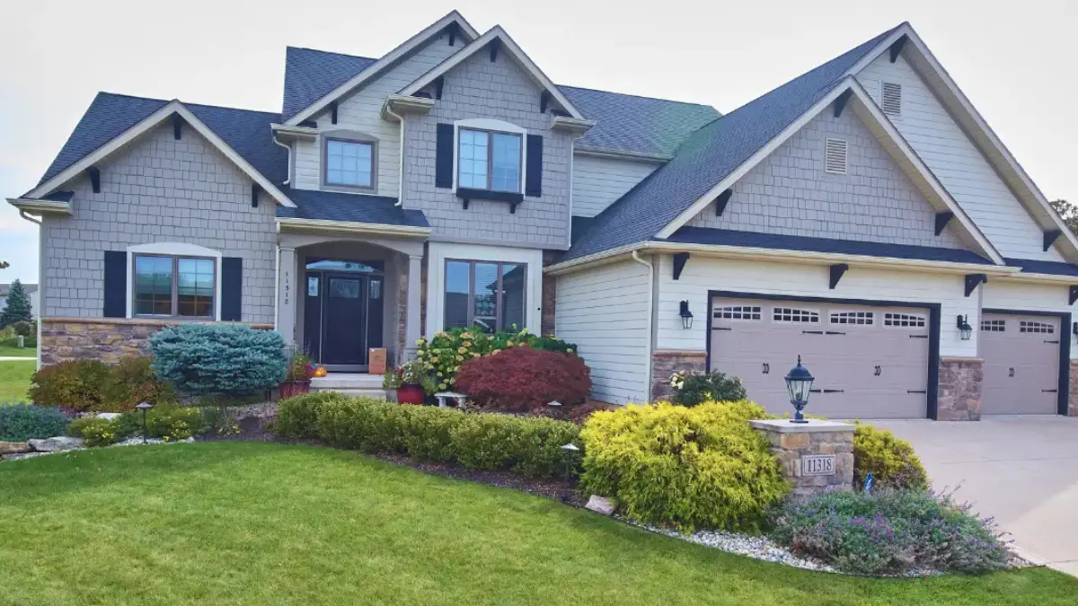 JDH Remodeling completed two-story Woodbridge Virginia home featuring new roofing, siding, windows, doors, and professional landscaping