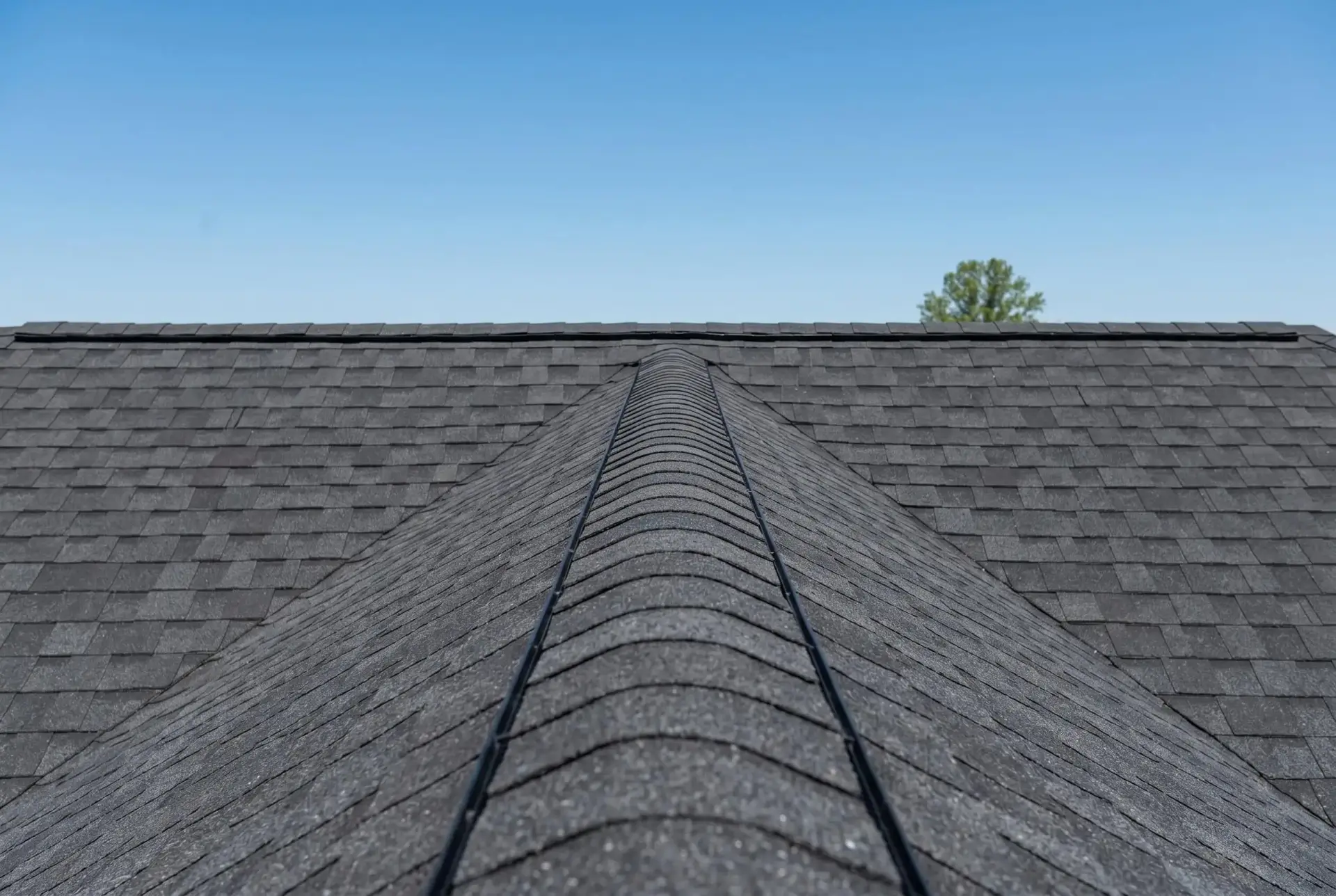 Continuous ridge vent at the high point of a JDH custom standing seam metal roof