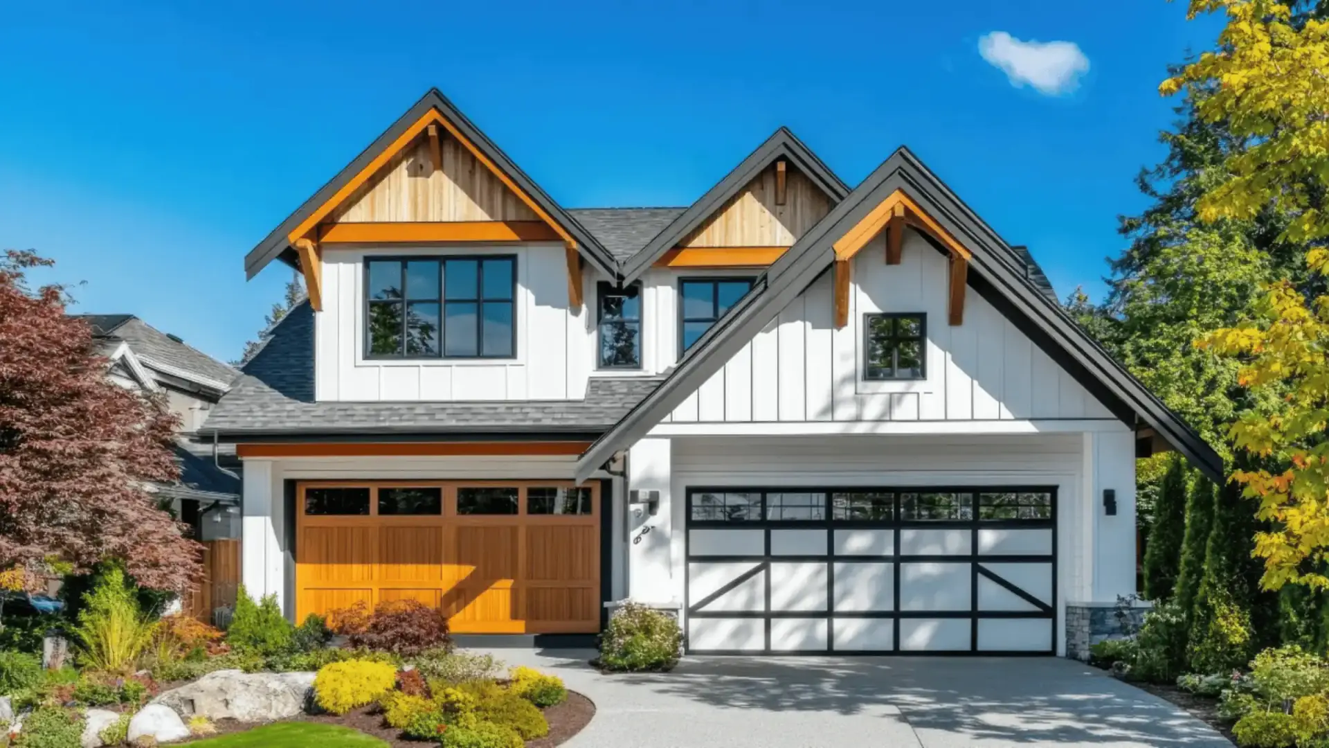 JDH Remodeling clean white board-and-batten siding with black-framed windows and wooden soffit overhang on a modern Bryans Road Maryland home