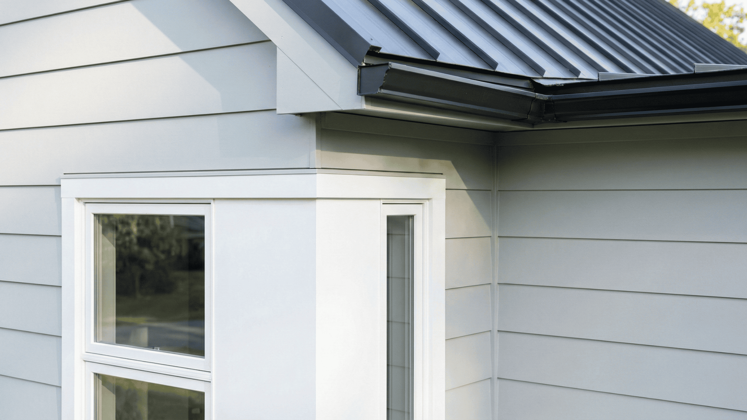 The intersection of roofing, siding, and windows on a modern Maryland home