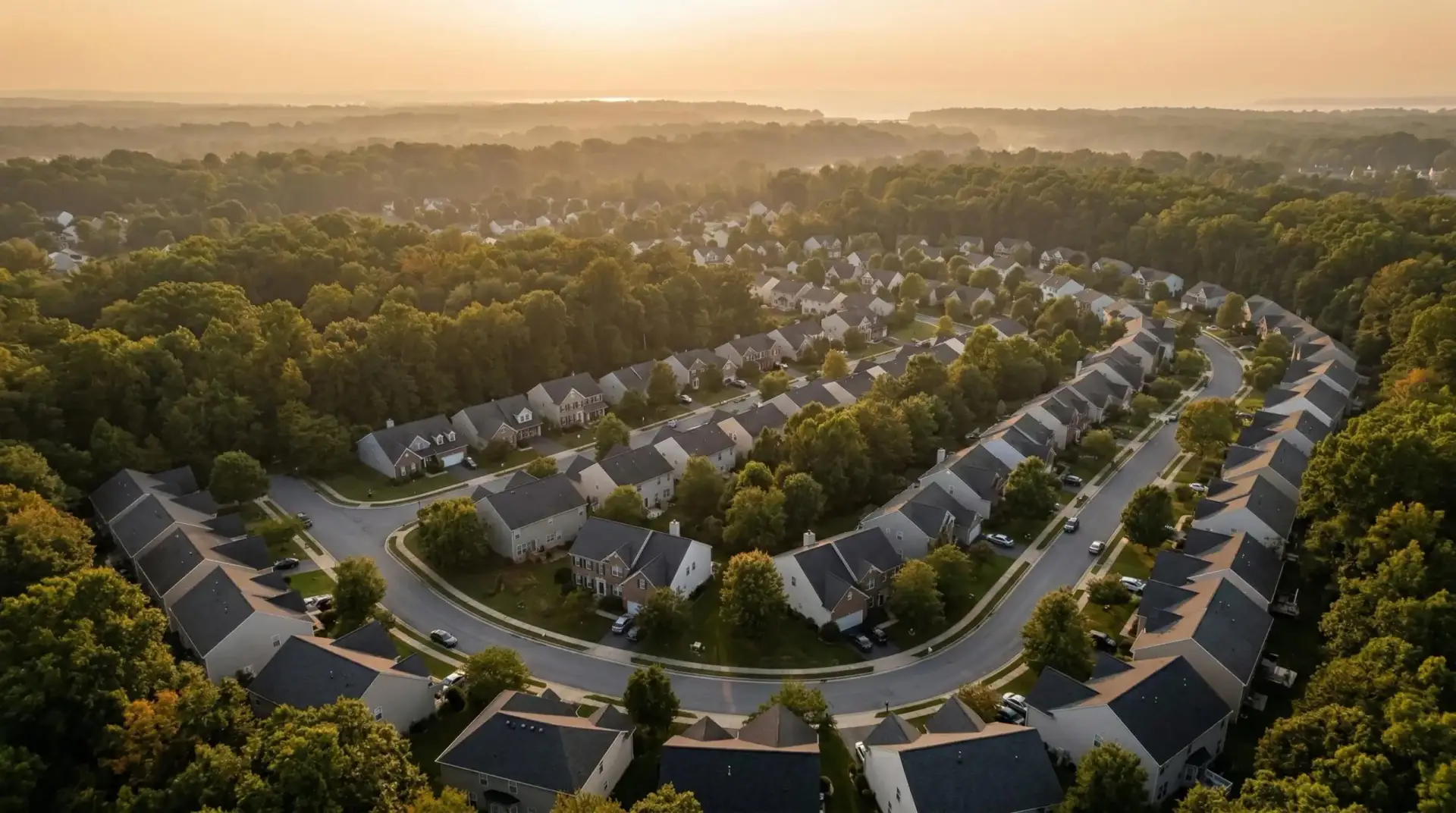 Aerial view of Maryland residential neighborhood with asphalt shingle roofs — JDH Remodeling homeowner roofing guide