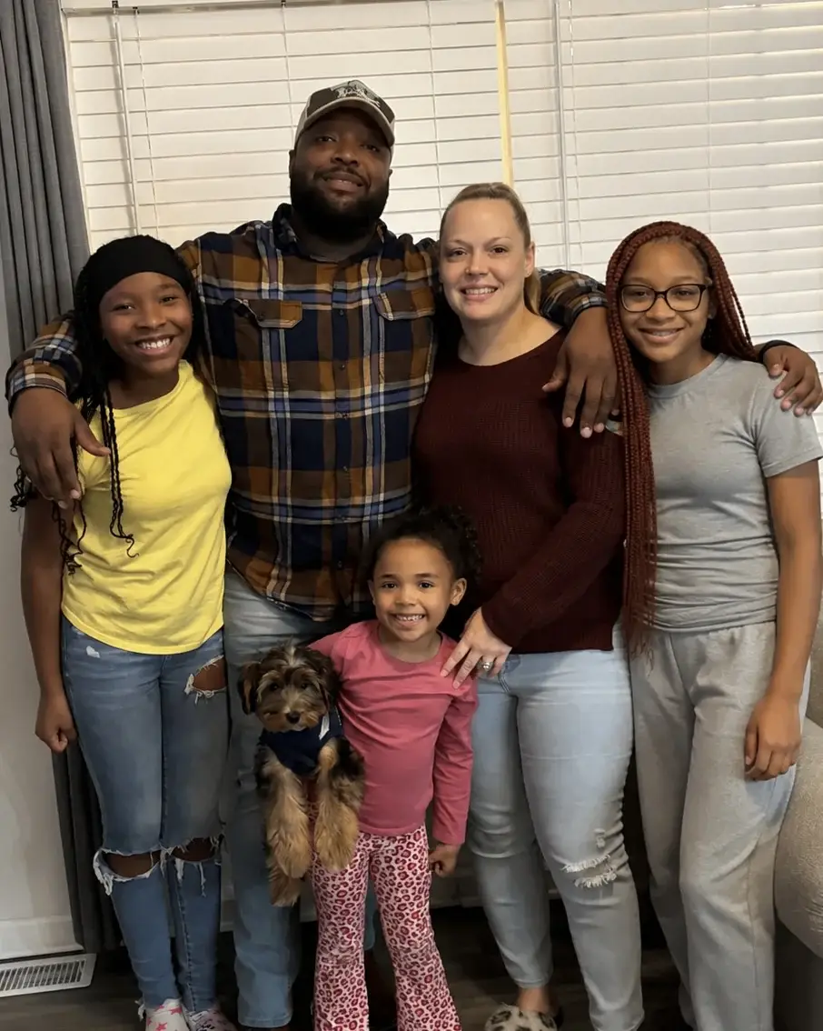 Jessica Commodore with her husband and three daughters