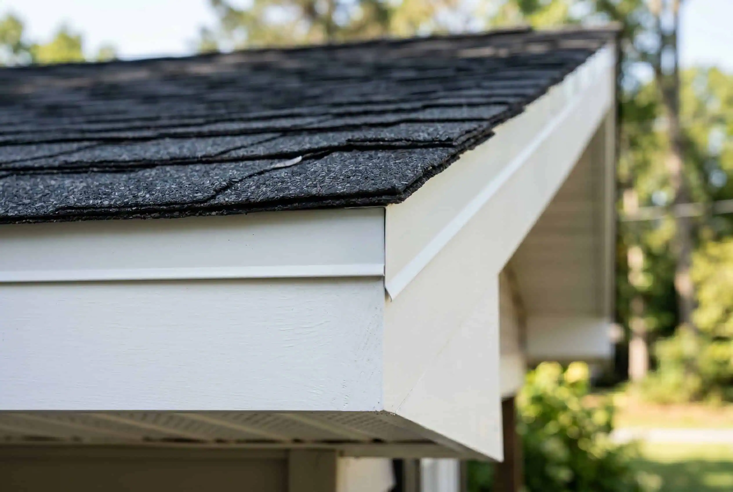 Aluminum drip edge flashing installed along the eave of a Maryland roof, directing water into the gutter